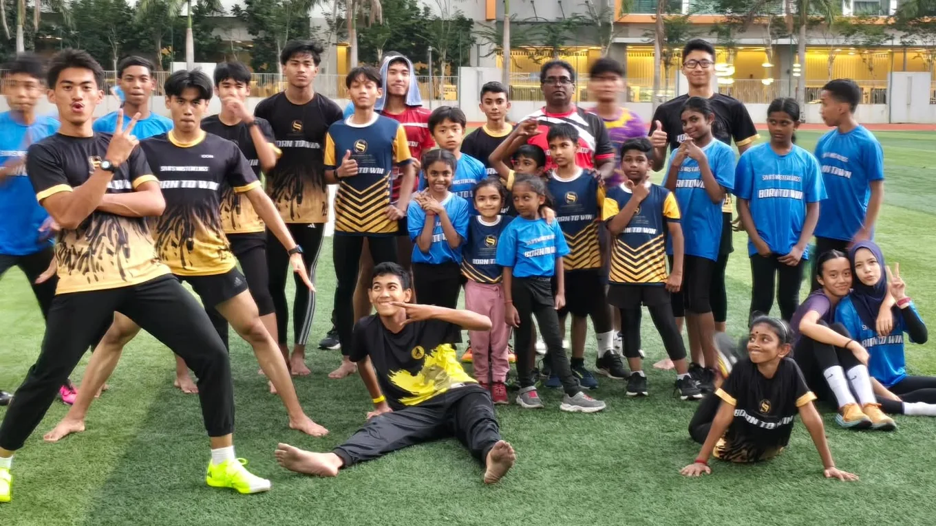 The squad gathered together on the field after a session