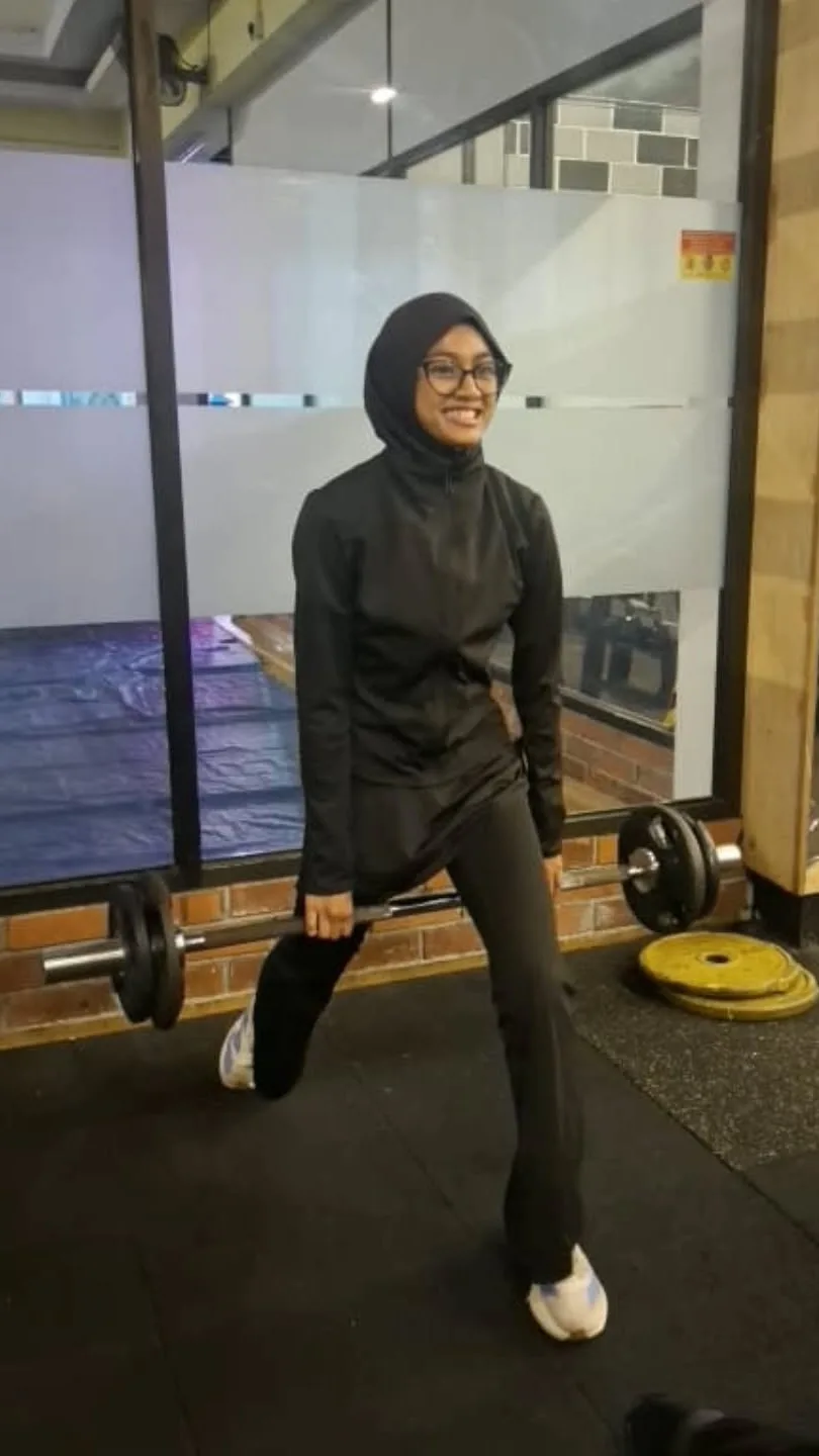 An athlete mid-movement during a gym session